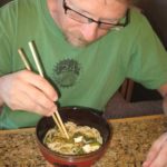 Gregg tries the experimental Asian-style cow parsnip soup. A spoon is actually better for getting the flavorful broth too.