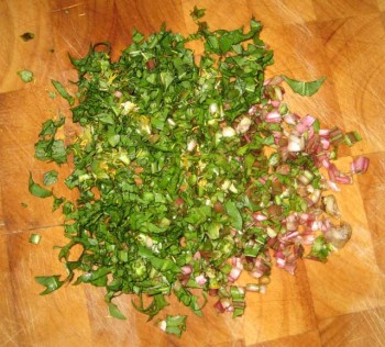 Finely chopped dandelion crowns, leaf stalks, and leaves. Note all the pretty colors!