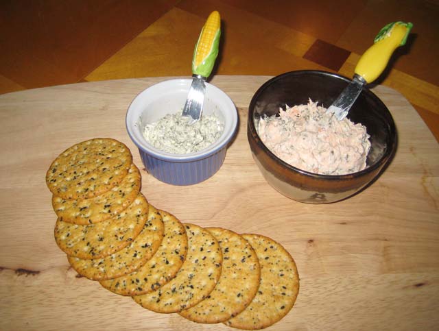 Two dock cream cheese spreads--one with garlic, the other with salmon.
