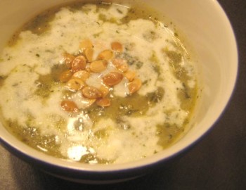 Acorn squash, nettle, and beer soup with kefir on top.