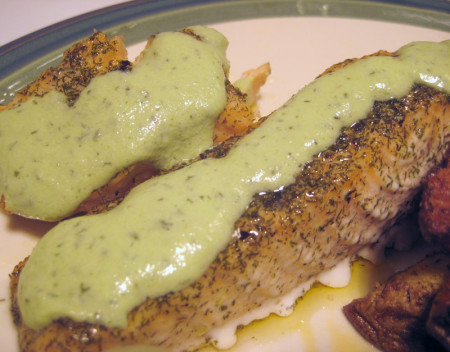 Creamy green yogurt sauce with spruce tip and dill on fish, delicious!