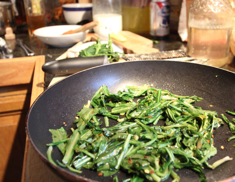 Chicory greens done in a style traditional to dandelion greens--pan-wilted in bacon fat with vinegar and red pepper flakes.